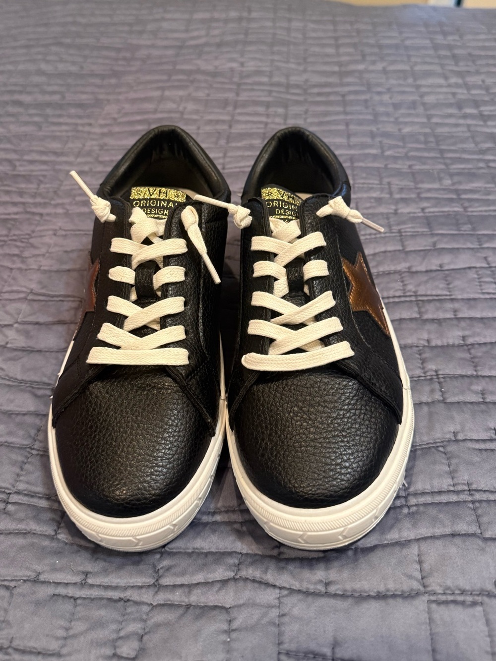 Black Leather Low-Top Sneakers with Brown Star Accent